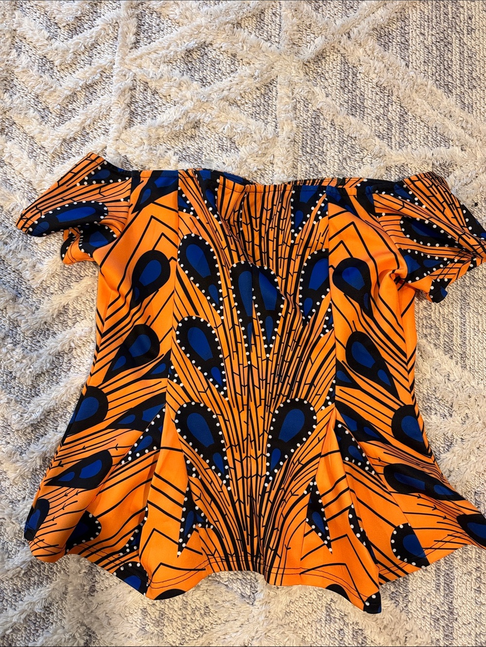 Off-Shoulder Peplum Blouse in Orange & Blue Graphic Print